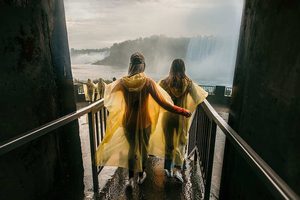 Two ladies entering the Journey Behind the Falls stage