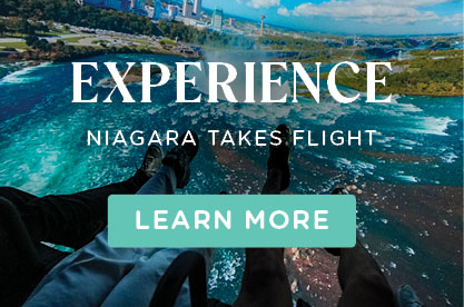 A top down view of water rushing over the falls